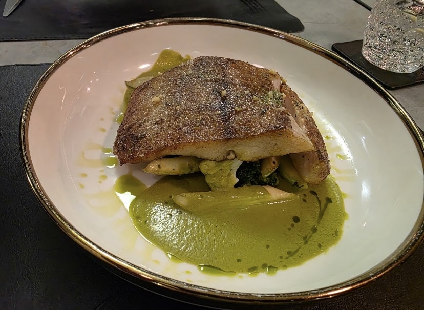 Seared fish on green purée